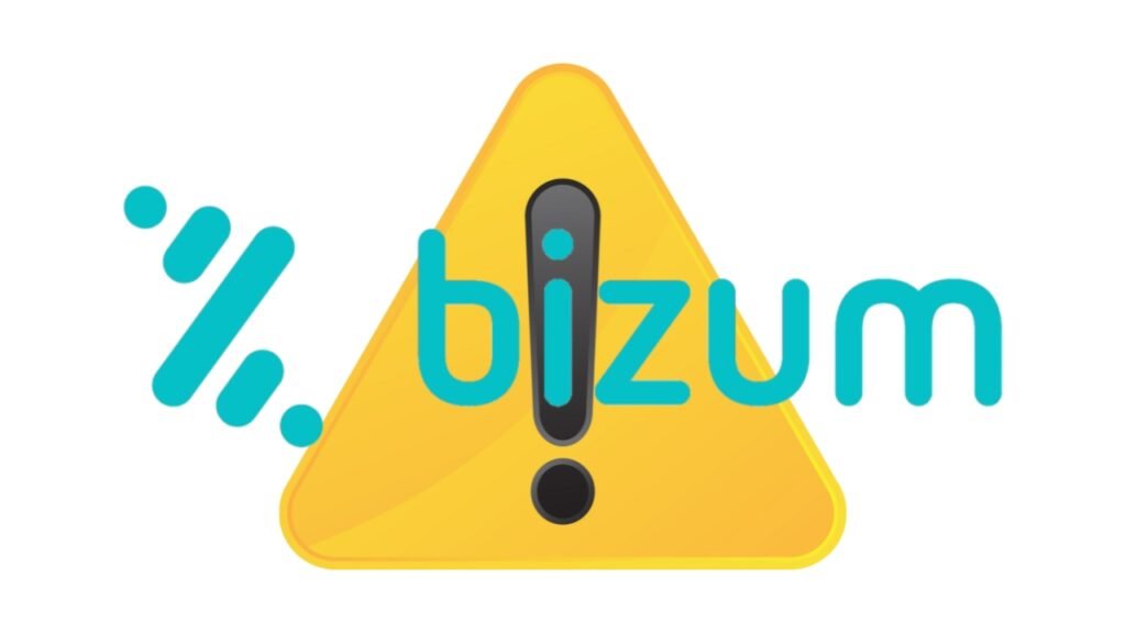 Teléfono móvil con Bizum abierto mostrando una transferencia, junto a documentos de Hacienda